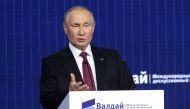 Russian President Vladimir Putin addresses the plenary session of the Valdai Discussion Club forum in the Moscow region on October 27, 2022. (Photo by Sergei KARPUKHIN / SPUTNIK / AFP)