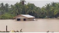 Flood waters surround a building following a heavy storm in Datu Odin Sinsuat, Maguindanao, Philippines October 28, 2022 in this still image obtained from a social media video. Alizain A. Tahir/via REUTERS