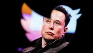 Elon Musk's photo is seen through a Twitter logo in this illustration taken on October 28, 2022. REUTERS/Dado Ruvic/Illustration/File Photo
 