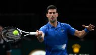 Serbia's Novak Djokovic plays a forehand return during the men's singles match between Serbia's Novak Djokovic and US' Maxime Cressy on day two of the ATP World Tour Masters 1000 - Paris Masters (Paris Bercy) - indoor tennis tournament at The AccorHotels Arena in Paris on November 1, 2022. (Photo by Christophe ARCHAMBAULT / AFP)