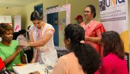 UNIQ volunteers conducting checkup during the event.