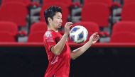 This file photo taken on November 15, 2021 shows Japan's defender Yuta Nakayama attending a training session in Muscat on the eve of the 2022 Qatar football World Cup Asian qualifying match between Oman and Japan. (Photo by Haitham AL-SHUKAIRI / AFP)