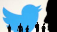Elon Musk photo, small figurines and Twitter logo are seen in this illustration taken November 4, 2022. (REUTERS/Dado Ruvic)