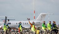 Climate activists protest against environmental pollution from aviation at Amsterdam's Schiphol Airport, in Schiphol, Netherlands, on November 5, 2022. REUTERS/Piroschka van de Wouw