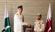 Deputy Chairman of the Executive Committee for Security and International Relations at Ministry of Defence Brigadier General Khaled Mohammed Al Nuaimi (right) with Pakistan’s Defence Attache to Qatar Commodore Sharjeel Iftikhar during signing of the memorandum of cooperation.