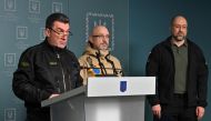 (From left to right) Secretary of the National Security and Defence Council of Ukraine Oleksiy Danilov, Ukrainian Minister of Defence Oleksii Reznikov and the Ukrainian Prime Minister Denys Shmyhal hold a press conference in Kyiv on November 7, 2022.  (Photo by Sergei SUPINSKY / AFP)