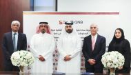 QNB & SADAD officials during the agreement signing.