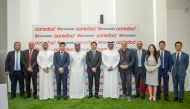Ooredoo and Huawei officials during the ceremony.
