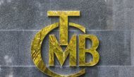 The logo of Turkey's Central Bank is pictured at the entrance of its headquarters in Ankara on October 15, 2021.  File Photo / Reuters
