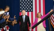 US President Joe Biden and First Lady Jill Biden arrive for a rally for gubernatorial candidate Wes Moore and the Democratic Party on the eve of the US midterm elections, at Bowie State University in Bowie, Maryland, on November 7, 2022. (Photo by Mandel NGAN / AFP)