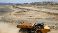 A truck is seen loaded with rocks for processing at an open pit at Dorowa mine in Hwedza, Zimbabwe, on October 22, 2019. File Photo / Reuters
