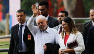 Brazilian President-elect Luiz Inacio Lula da Silva leaves the Centro Cultural do Banco do Brasil after a meeting with politicians from the transition teams in Brasilia, on November 10, 2022.  (Photo by Sergio Lima / AFP)