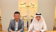 Qatar Tourism Chairman and Qatar Airways Group Chief Executive Akbar Al Baker (right) and Trip.com Group Chairman and Co-Founder James Liang during the signing of the agreement.