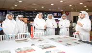 Minister of Communications and Information Technology H E Mohammed bin Ali bin Mohammed Al Mannai with other officials during his visit to one of the service and operation centers.