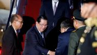 Cambodia's Prime Minister Hun Sen arrives at Ngurah Rai International Airport ahead of the G20 Summit in Bali, Indonesia, November 14, 2022. (REUTERS/Ajeng Dinar Ulfiana)