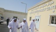 Minister of Transport H E Jassim Saif Ahmed Al Sulaiti visiting the Mukaynis Meteorology Center, yesterday.