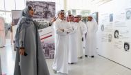 Minister of State and President of Qatar National Library H E Dr. Hamad bin Abdulaziz Al Kawari (second left) during the inauguration of the exhibition.