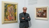 James Warhola, US artist and illustrator, stands next to his uncle Andy Warhol痴 