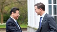 Prime Minister Mark Rutte (right) of the Netherlands shakes hands with China's President Xi Jinping as he welcomes Xi on the second day of his state visit, at The Hague on March 23, 2014. File photo / Reuters