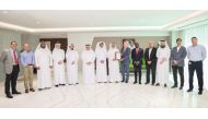  Dolphin Energy officials with the ISO 9001:2015 certificate.