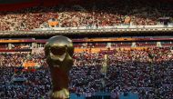 November 21, 2022 General view of a FIFA World Cup giant replica trophy on the pitch before the match REUTERS/Hannah Mckay 