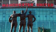 General view of the United Trinity statue outside Old Trafford.  REUTERS/Phil Noble