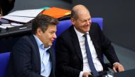 German Economy and Climate Minister Robert Habeck and German Chancellor Olaf Scholz speak during budget debate in the plenary hall of German lower house of parliament, or Bundestag, in Berlin, Germany, on November 23, 2022. REUTERS/Christian Mang