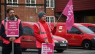 Royal Mail workers strike outside of the Richmond Delivery Office in London, Britain, November 24, 2022. REUTERS/Toby Melville