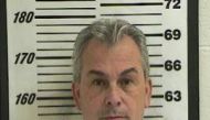 Michael Taylor, who was implicated in enabling the dramatic escape of former Nissan Motor Co. boss Carlos Ghosn, is seen in a booking photograph from October 2012 on unrelated charges. | DAVIS COUNTY SHERRIFF'S OFFICE/ VIA REUTERS

