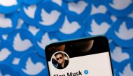 Elon Musk's Twitter profile is seen on a smartphone placed on printed Twitter logos in this picture illustration taken on April 28, 2022. File Photo / Reuters