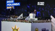 Turkish President Recep Tayyip Erdogan addresses a rally at the Galatasaray's Nef Stadium in Istanbul on November 27, 2022. (Photo by Yasin AKGUL / AFP)