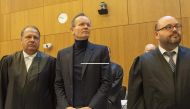 Former Wirecard CEO Markus Braun (center) stands next to his lawyers Alfred Dierlamm (left) and Nico Werning in the courtroom at the District Court in Munich, southern Germany on December 8, 2022. (Photo by Christof STACHE / AFP)