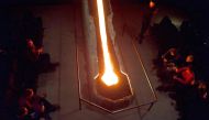 Real molten lava originated from tephra and that erupted in 1918 from the Katla Volcano in southern Iceland, cools down on the basalt structure at the Lava Show showroom in Reykjavik city center, Iceland, on December 1, 2022. (Photo by Jeremie RICHARD / AFP)