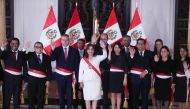 Peru's President Dina Boluarte, who took office after her predecessor Pedro Castillo was ousted, poses for a family photo along with members of her Cabinet in Lima, Peru, on December 10, 2022. REUTERS/Sebastian Castaneda