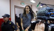 US basketball player Brittney Griner, who was detained at Moscow's Sheremetyevo airport and later charged with illegal possession of cannabis, is escorted before the verdict in Khimki outside Moscow, Russia, on August 4, 2022. File Photo / Reuters