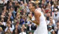 Belarus' Aryna Sabalenka celebrates winning her first-round match against Britain's Katie Boulter at the Wimbledon - All England Lawn Tennis and Croquet Club, London, Britain, June 30, 2021. (REUTERS/Toby Melville)