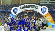 Al Hilal's players celebrate with the trophy after winning the AFC Champions League final in this file photo.