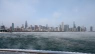 Mist rises from Lake Michigan in Chicago on December 23, 2022, where temperatures reached -6F (-21C) ahead of the Christmas holiday. Photo by Kamil Krzaczynski / AFP