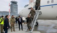 Ukrainian President Volodymyr Zelensky leaves a plane to meet with Polish President Andrzej Duda (not pictured) after Zelensky's visit to Washington, at Rzeszow-Jasionka Airport, Poland, on December 22, 2022. Jakub Szymczuk/KPRP/Handout via REUTERS