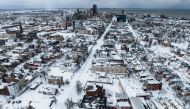 Snow blankets the city in this aerial drone photograph in Buffalo, New York, on December 25, 2022. Photo by Joed Viera / AFP