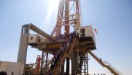 Engineers and visitors explore an exploratory well near Dharoor town, 350 km (217 miles) from the port of Bosasso on the Gulf of Aden in Puntland January 17, 2012. File Photo / Reuters