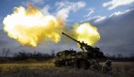 Ukrainian servicemen fire with a CAESAR self-propelled howitzer towards Russian positions in eastern Ukraine on December 28, 2022. (Photo by Sameer Al-Doumy / AFP)