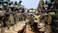 Soldiers of the South Sudan People's Defence Forces (SSPDF) prepare to be deployed to the Democratic Republic of Congo (DRC) after their departure ceremony at the SSPDF Headquarters in Juba on December 28, 2022.  (Photo by Samir BOL / AFP)