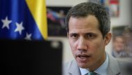 Handout picture released by the press office of opposition leader Juan Guaido showing Guaido taking part in a virtual meeting with members of the old Parliament, elected in 2015, in Caracas on December 30, 2022. Photo by Leo Alvarez / Juan Guaido's Photography service / AFP