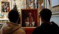 Faithful gather to mourn the death of former Pope Benedict at Santa Maria dell'Anima church, in Rome, Italy December 31, 2022. REUTERS/Ciro De Luca