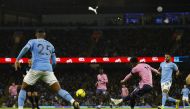 Everton's Demarai Gray scores the equalizer during the English Premier League match against Manchester City at the Etihad Stadium in Manchester on December 31, 2022.  Action Images via Reuters/Andrew Boyers 