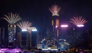 Fireworks explode over Victoria Harbour to celebrate the New Year in Hong Kong, China January 1, 2023. REUTERS/Tyrone Siu