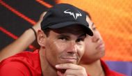 Spain's Rafael Nadal gestures as he watches the women's singles match between Australia's Maddison Inglis and Spain's Nuria Diaz on day five of the United Cup tennis tournament in Sydney on January 2, 2023. (Photo by DAVID GRAY / AFP) /