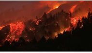 Lava pours out of a volcano in the Cumbre Vieja national park at El Paso, on the Canary Island of La Palma, September 19, 2021, in this screen grab taken from a video.  File Photo / Reuters
