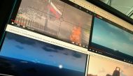 Photo illustration generated in an office in Washington, DC on December 28, 2022, shows a computer screen with four YouTube windows displaying combat clips from Arma 3's war-themed video games. AFP